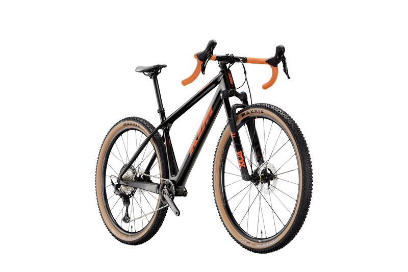Bicicletta Monster Cross KTM X-Myroon Master in carbonio color arancione e nero, con manubrio drop bar da gravel e forcella ammortizzata Fox